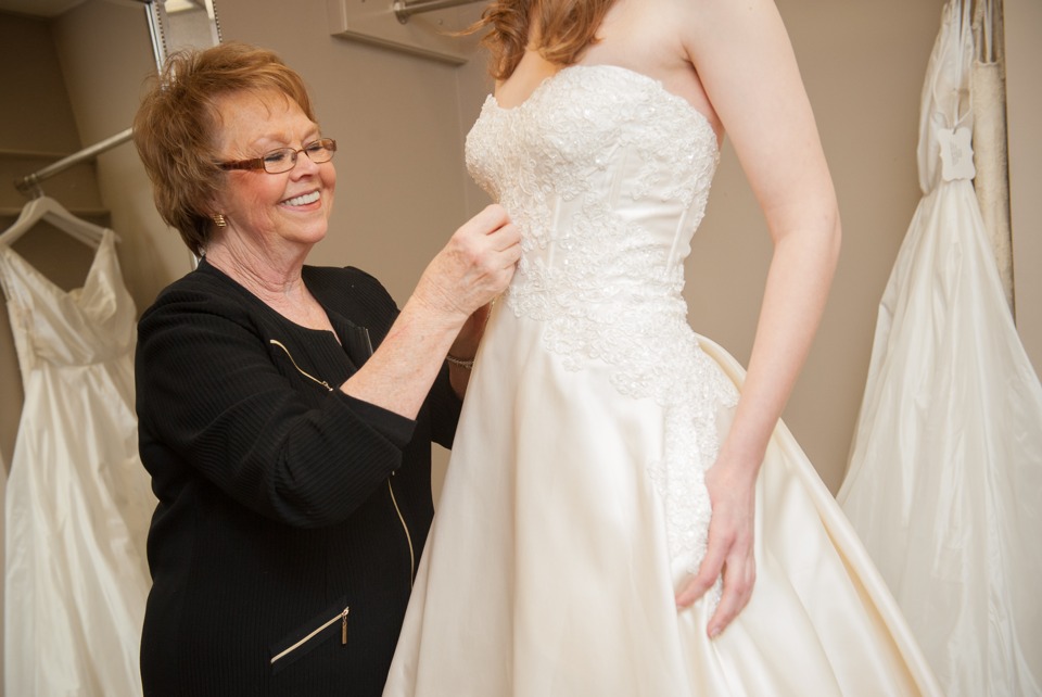 expert seamstress performing alterations at the white room birmingham
